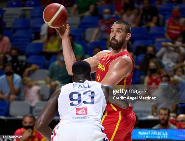 Marc Gasol of Spain competes for the ball with Moustapha Fall during an international basketball friendly match between Spain and France at Martin...