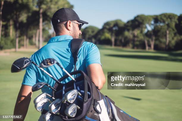 golfista - bolsa de golf fotografías e imágenes de stock