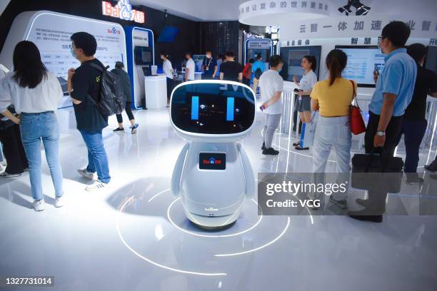 People visit a Baidu booth during 2021 World Artificial Intelligence Conference at Shanghai World Expo Center on July 7, 2021 in Shanghai, China.