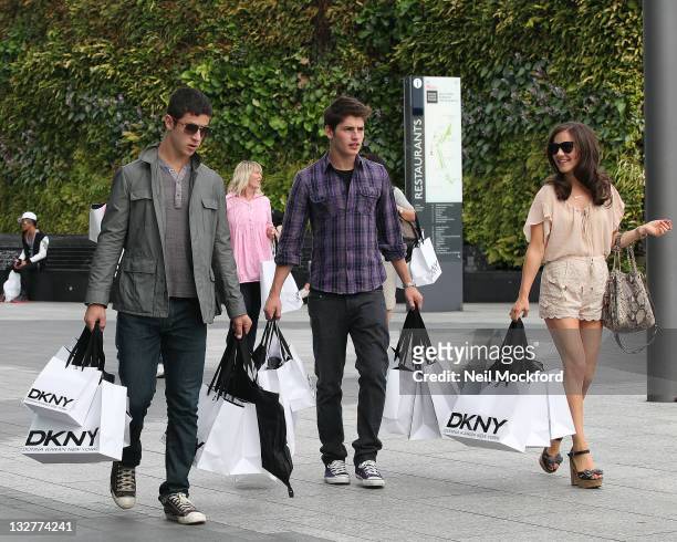 Gregg Sulkin and Electra Formosa and David Henrie from Disney's 'Wizards of Waverly Place' sighted shopping at DKNY in Westfield shopping centre at...