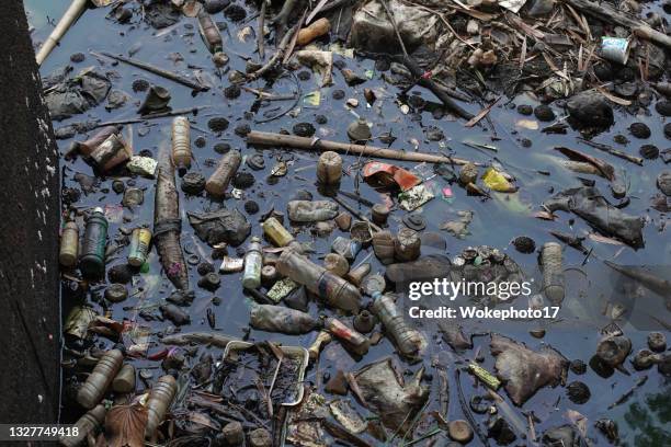 water pollution - river pollution stock pictures, royalty-free photos & images