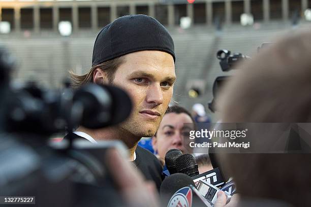 Tom Brady speaks with the press at the flag football kick off for the 2011 Audi Best Buddies Challenge at Harvard Stadium on June 3, 2011 in Boston,...
