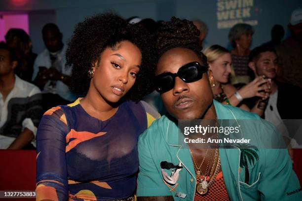 Musician Shelah Marie and Rapper Ace Hood pose in the front row during at Faena Forum on July 08, 2021 in Miami Beach, Florida.