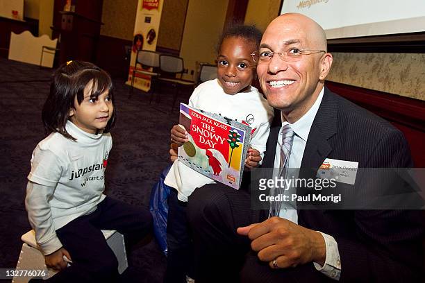 James Cleveland, CEO, Jumpstart, poses for a photo with Jumpstart participants during the 5th annual Jumpstart Read for the Record Day at US Capitol...