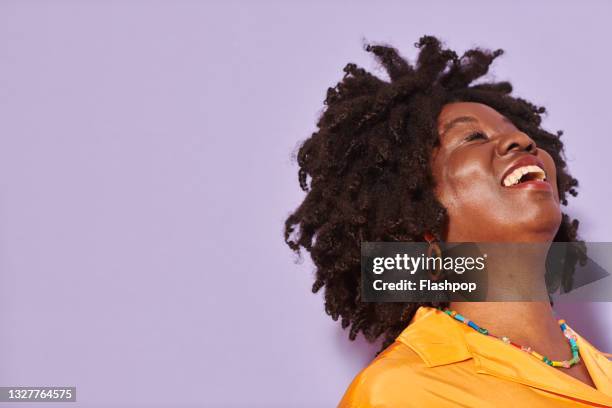 portrait of mature woman laughing - visual impairment - fotografias e filmes do acervo