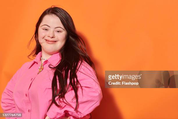 close up portrait of confident, happy young woman - persons with disabilities stock-fotos und bilder