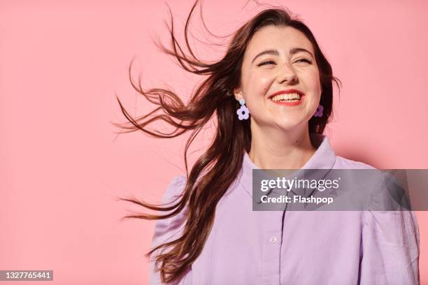 portrait of confident, happy young woman laughing - woman looking up bildbanksfoton och bilder