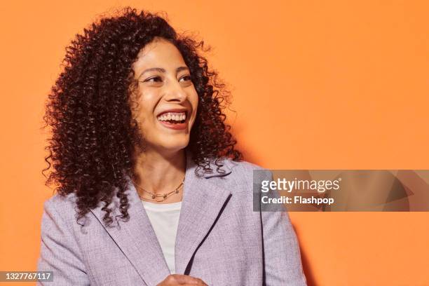 Portrait of confident, happy mature woman laughing