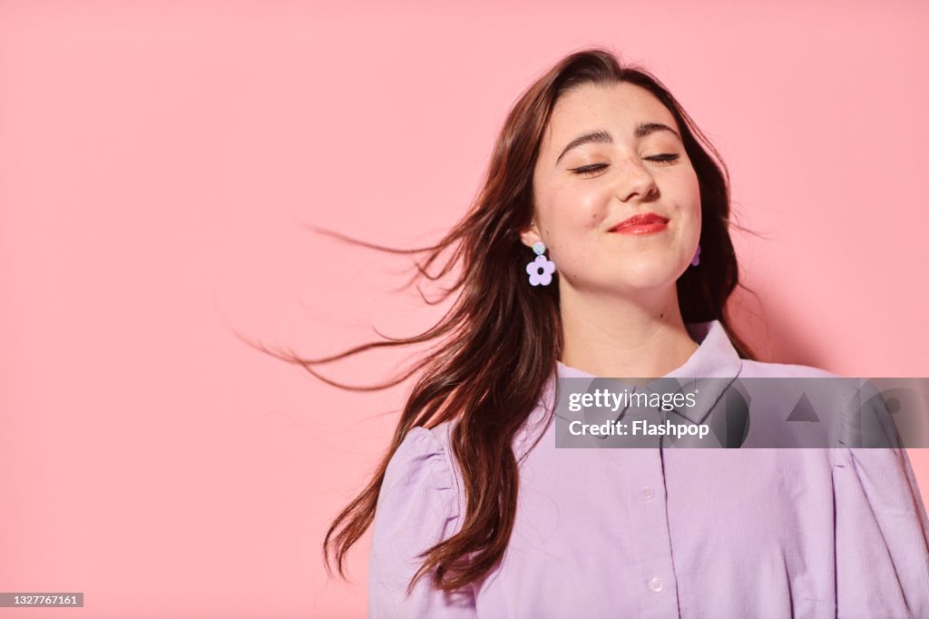 Portrait of confident, happy young woman