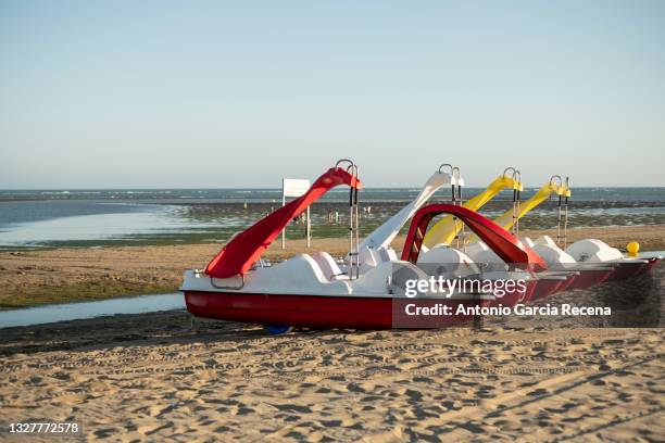 pleasure pedal boats in isla canela, huelva, andalusia, spain. - pedal boat photos et images de collection