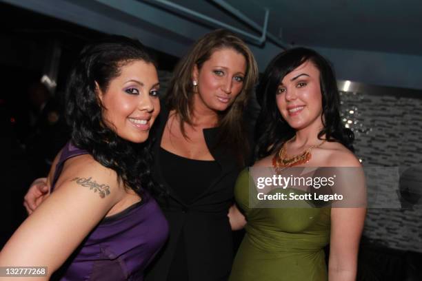 Guests attend the Dirty Money Tour after party hosted by Braylon Edwards of the NY Jets at Pioneer High School on April 16, 2011 in Ann Arbor,...