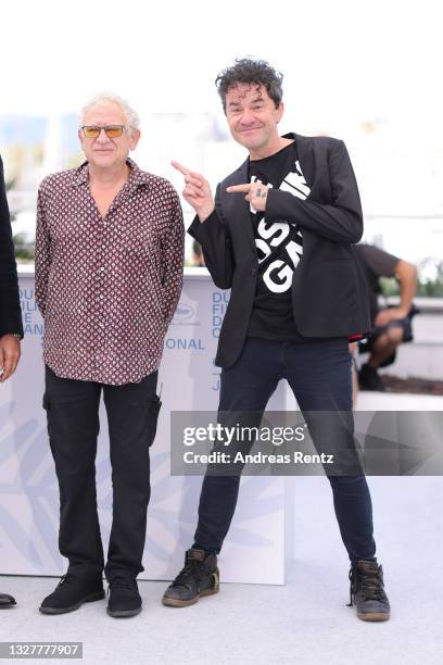 Producer Jeremy Thomas and Director Mark Cousins attend "The Storms of Jeremy Thomas" photocall during the 74th annual Cannes Film Festival on July...