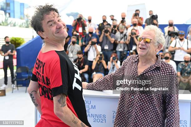 Director Mark Cousins and Producer Jeremy Thomas attend "The Storms of Jeremy Thomas" photocall during the 74th annual Cannes Film Festival on July...