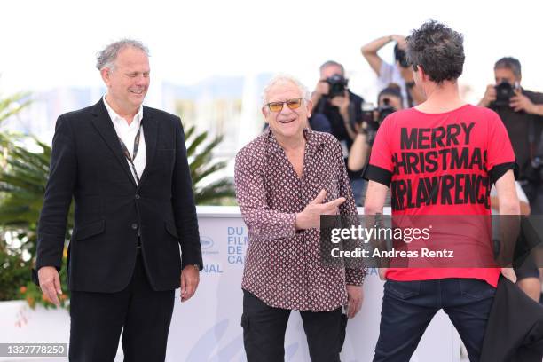 Producer David P. Kelly, Producer Jeremy Thomas and Director Mark Cousins attends "The Storms of Jeremy Thomas" photocall during the 74th annual...