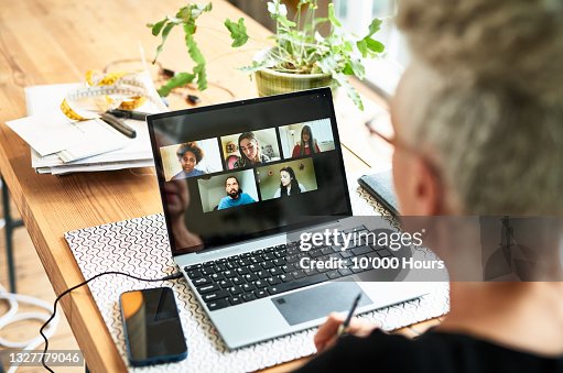 Senior businesswoman using laptop for team meeting video conference Senior businesswoman using laptop for team meeting video conference