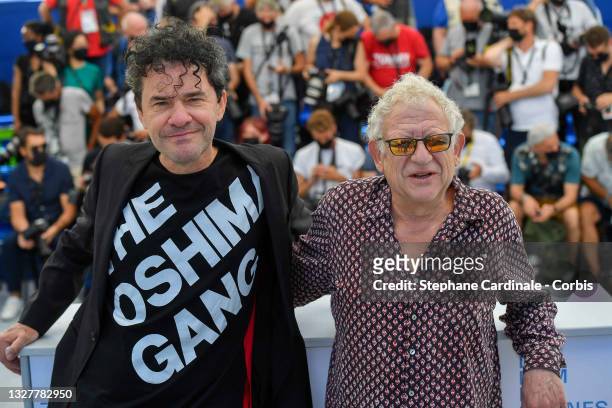 Director Mark Cousins and Producer Jeremy Thomas attend "The Storms of Jeremy Thomas" photocall during the 74th annual Cannes Film Festival on July...