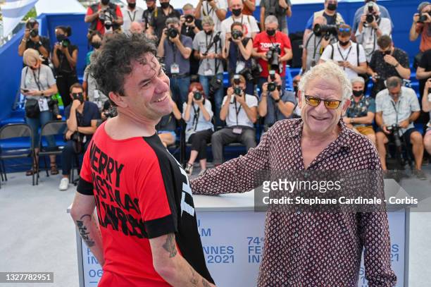Director Mark Cousins and Producer Jeremy Thomas attend "The Storms of Jeremy Thomas" photocall during the 74th annual Cannes Film Festival on July...