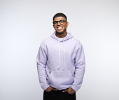 Cheerful young man wearing lilac hoodie