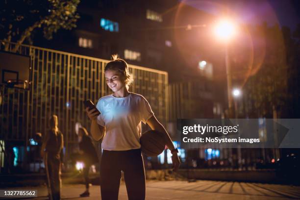 female basketballer - making a basket stock pictures, royalty-free photos & images