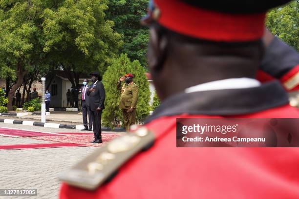 South Sudan's President Salva Kiir faces members of the Republican Guard of Honour, during the national anthem, at the Office of the President,...