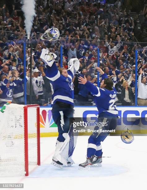 The Tampa Bay Lightning celebrate victory over the Montreal Canadiens at the end of Game Five of the 2021 NHL Stanley Cup Final at the Amalie Arena...