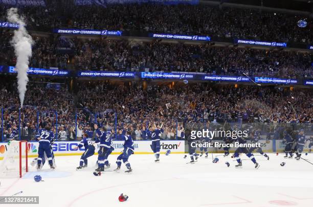 The Tampa Bay Lightning celebrate victory over the Montreal Canadiens at the end of Game Five of the 2021 NHL Stanley Cup Final at the Amalie Arena...