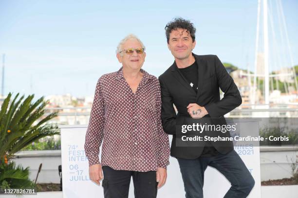 Producer Jeremy Thomas and Director Mark Cousins attend "The Storms of Jeremy Thomas" photocall during the 74th annual Cannes Film Festival on July...