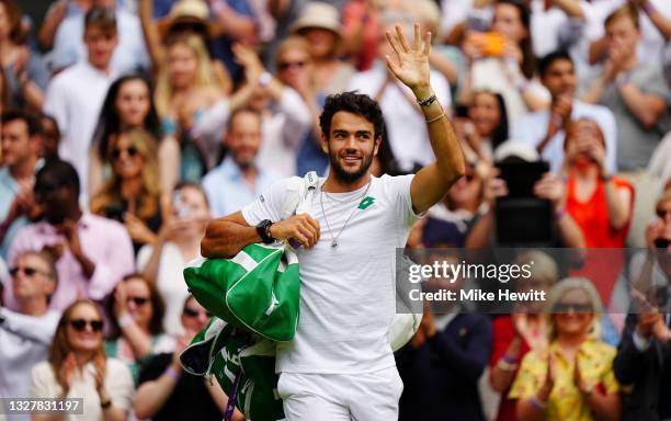 Matteo Berrettini of Italy waves to the crowd as he walks off the court after winning his Men's Singles Semi-Final match against Hubert Hurkacz of...