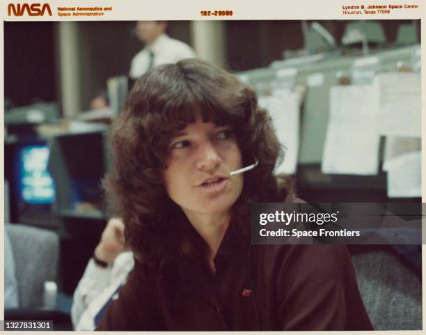 Mission specialist astronaut Sally K Ride, STS-3 spacecraft communicator, converses with the crew aboard the Earth-orbiting Space Shuttle Columbia on...