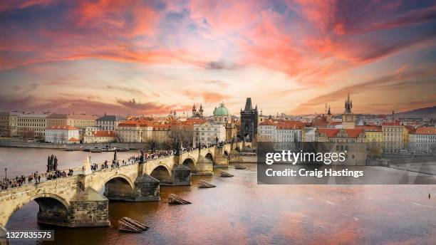prague sunset, capital city of the czech republic, is bisected by the vltava river. europe eu - czech republic imagens e fotografias de stock