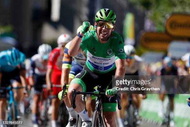 Mark Cavendish of The United Kingdom and Team Deceuninck - Quick-Step Green Points Jersey celebrates at arrival during the 108th Tour de France 2021,...