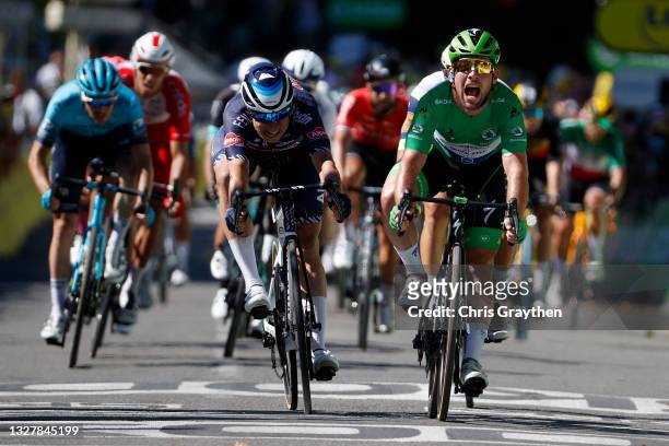 Jasper Philipsen of Belgium and Team Alpecin-Fenix & Mark Cavendish of The United Kingdom and Team Deceuninck - Quick-Step Green Points Jersey sprint...