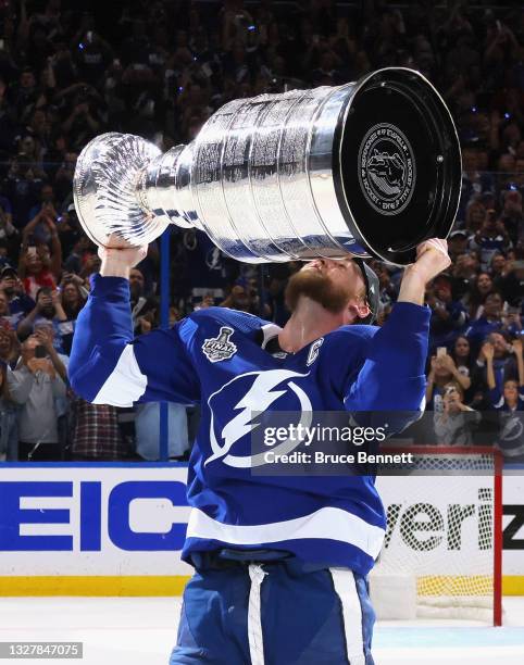 Steven Stamkos of the Tampa Bay Lightning celebrates with the Stanley Cup following the victory over the Montreal Canadiens in Game Five of the 2021...