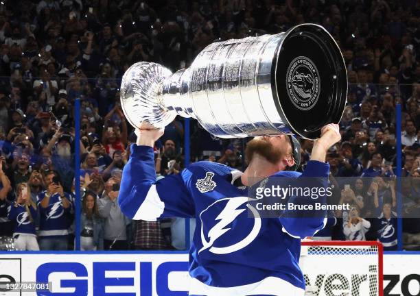 Steven Stamkos of the Tampa Bay Lightning celebrates with the Stanley Cup following the victory over the Montreal Canadiens in Game Five of the 2021...
