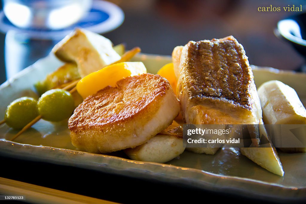 Fish and scallops grilled