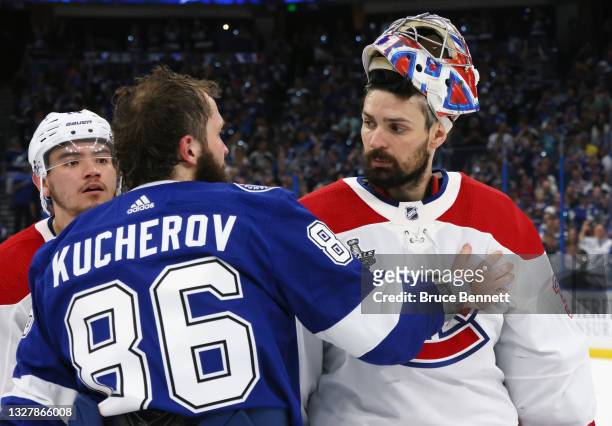 Carey Price of the Montreal Canadiens and Nikita Kucherov of the Tampa Bay Lightning shake hands following the Lightning's victory over the Montreal...