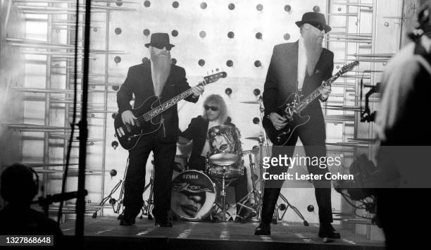 American guitarist Dusty Hill, American drummer Frank Beard and American guitarist Billy Gibbons, of the American rock band ZZ Top, play during the...