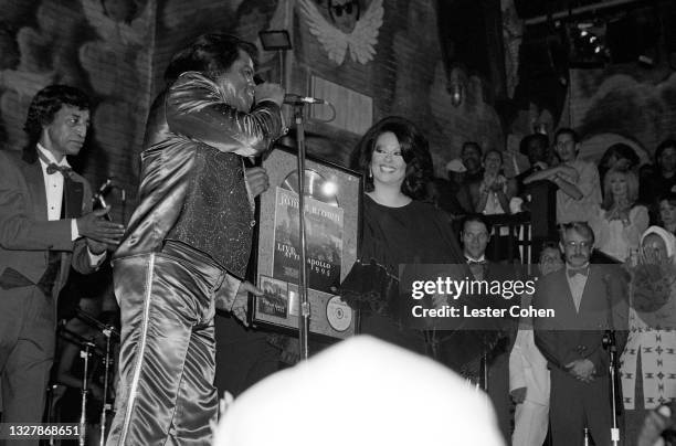 American disc jockey Frankie Crocker and American singer, songwriter, dancer, musician, record producer, and bandleader James Brown and Brown's wife...