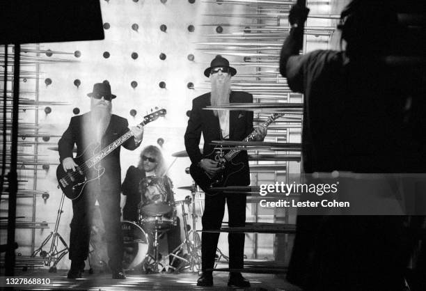 American guitarist Dusty Hill, American drummer Frank Beard and American guitarist Billy Gibbons, of the American rock band ZZ Top, play during the...