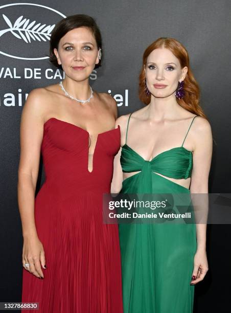 Maggie Gyllenhaal and Jessica Chastain attend the photocall ahead of the Chopard Trophy dinner during the 74th annual Cannes Film Festival on July...