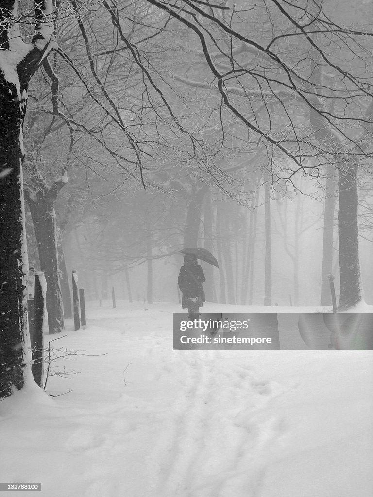 Woman walking on snow