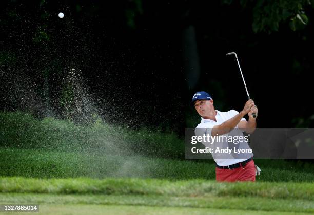 Jonathan Byrd plays a shot from a bunker on the ninth hole during the second round of the John Deere Classic at TPC Deere Run on July 09, 2021 in...