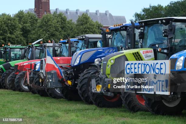 Dutch farmers' tractors are parked during a protest against the government's plans to reduce nitrogen emissions in the country in The Hague,...