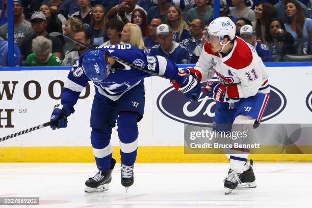 Brendan Gallagher of the Montreal Canadiens hits Blake Coleman of the Tampa Bay Lightning in Game Five of the 2021 NHL Stanley Cup Final at the...