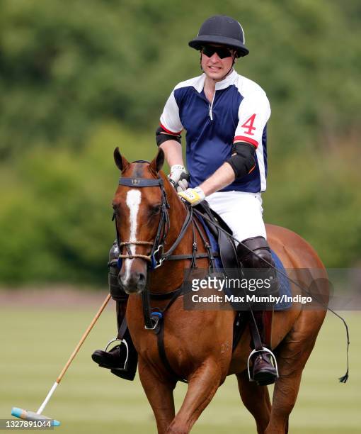 Prince William, Duke of Cambridge plays in the Out-Sourcing Inc. Royal Charity Polo Cup at Guards Polo Club, Flemish Farm on July 9, 2021 in Windsor,...