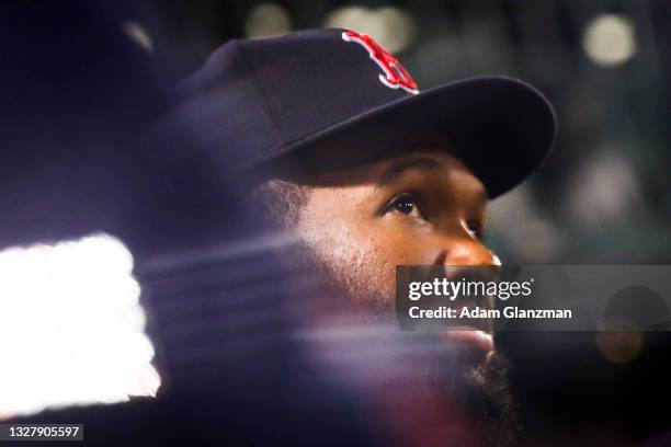Danny Santana of the Boston Red Sox looks on from the dugout during a game against the Philadelphia Phillies at Fenway Park on July 9, 2021 in...