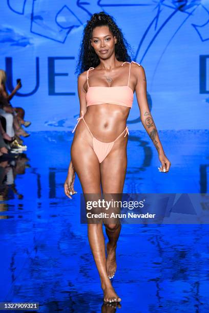 Jessica White walks the runway at the Jacque Designs Swimwear Show during Miami Swim Week Powered By Art Hearts Fashion at Faena Forum on July 09th,...