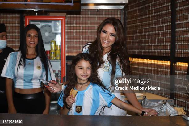 Dorismar and her daughter poses for photo during during the presentation of the first single for Caín Guzmán at Hipodromo Condesa on July 9, 2021 in...