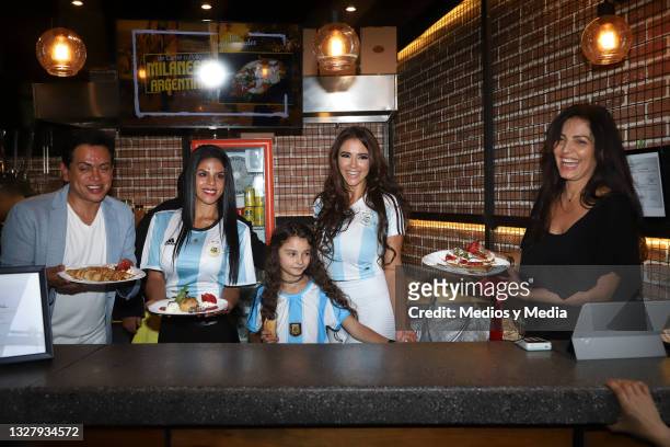 Dorismar and her family poses for photo during during the presentation of the first single for Caín Guzmán at Hipodromo Condesa on July 9, 2021 in...