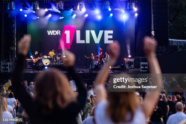 Alice Merton performs live on stage during the 1LIVE Festivalsommer at Waldfreibad Walbeck on July 09, 2021 in Geldern, Germany.